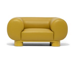 Aster, Fauteuil aux accoudoirs cylindriques, de forme douce et g�n�reuse
